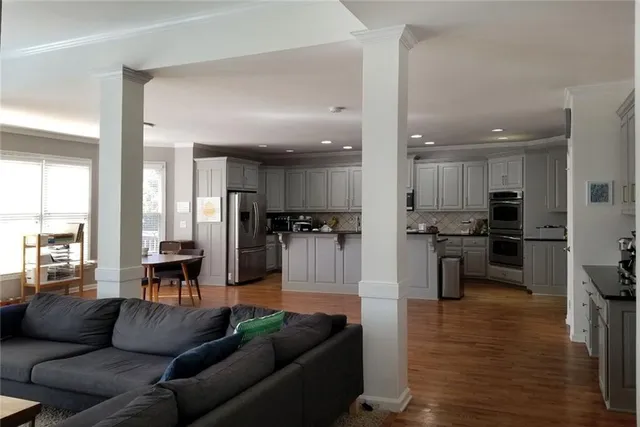 a living room with furniture and a window