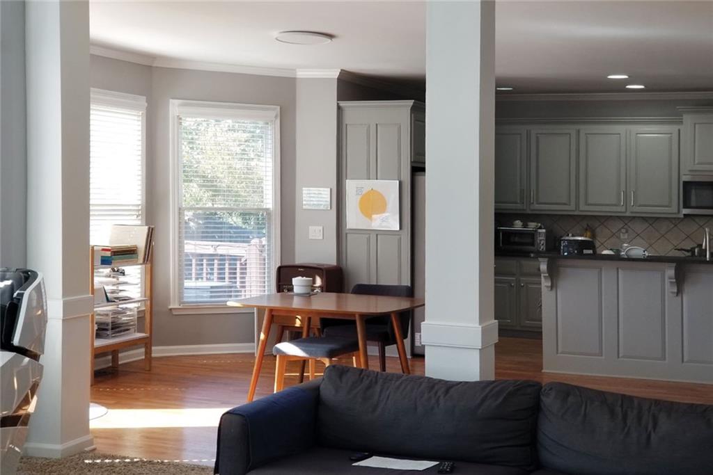 1799 Mapmaker Drive Northeast Dacula, GA 30019 - Photo 22 of 69 a living room with furniture and a window