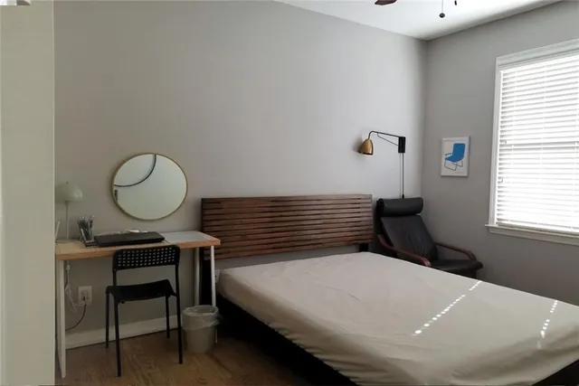 a view of a room that has a bench in it