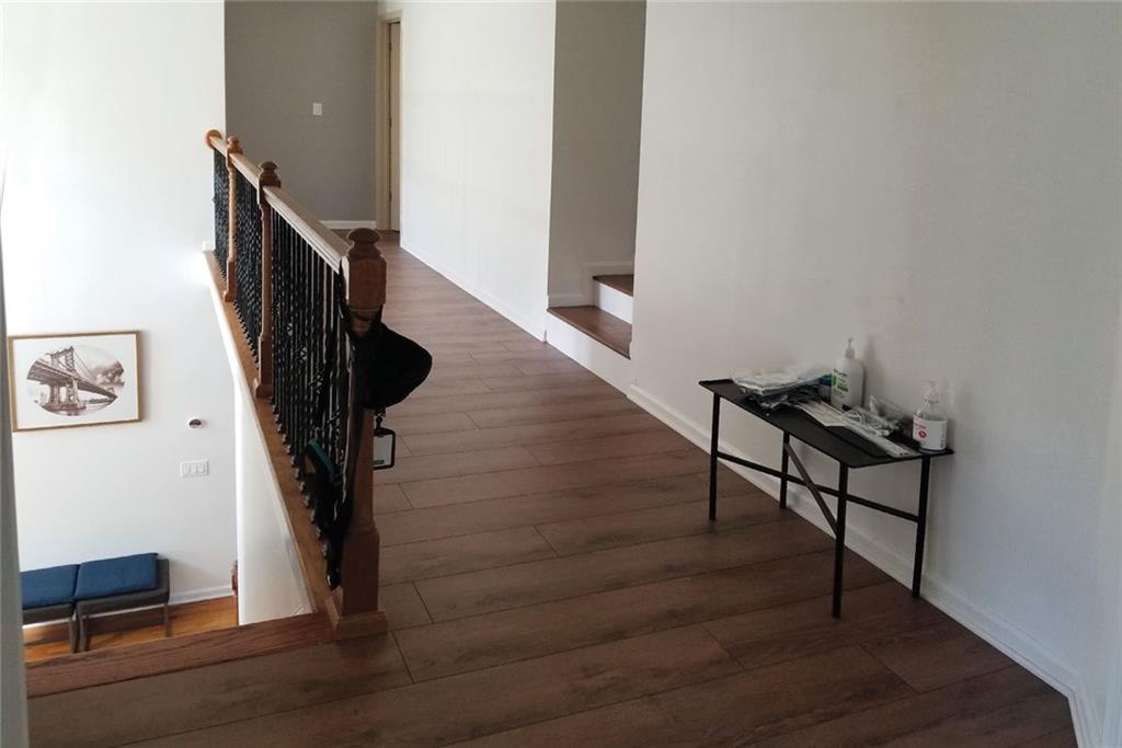 1799 Mapmaker Drive Northeast Dacula, GA 30019 - Photo 25 of 69 a view of entryway with stairs and wooden floor