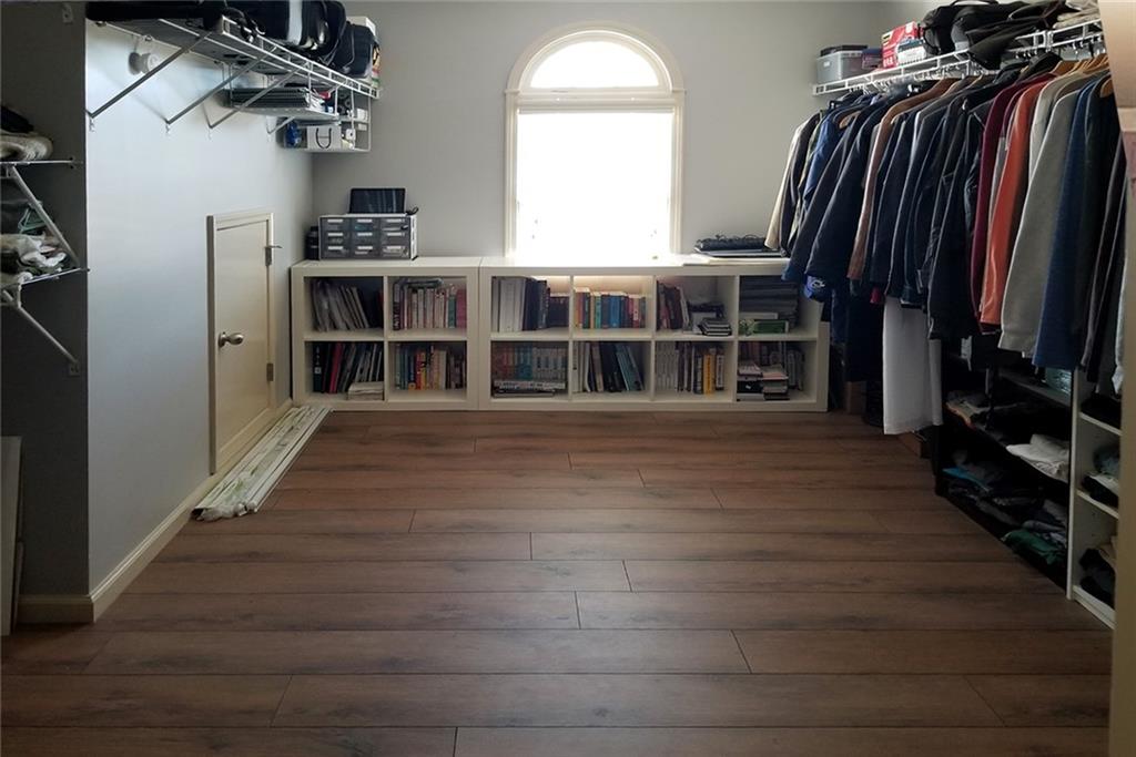 1799 Mapmaker Drive Northeast Dacula, GA 30019 - Photo 36 of 69 a view of a walk in closet