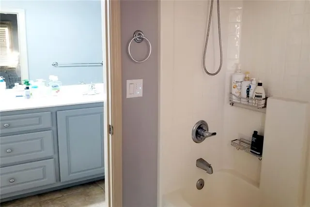 a kitchen with a table and chairs in it