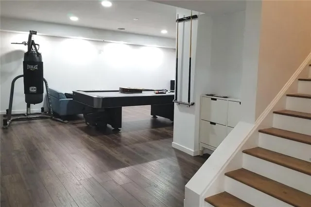 a kitchen with stainless steel appliances a sink and cabinets