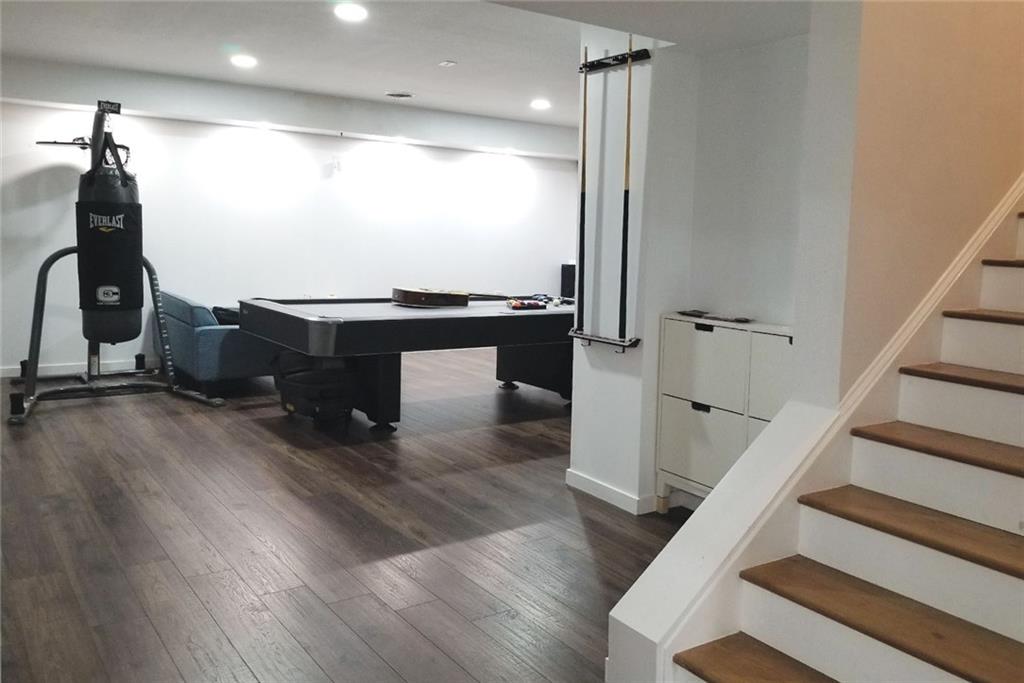 1799 Mapmaker Drive Northeast Dacula, GA 30019 - Photo 43 of 69 a view of entryway and hall with wooden floor
