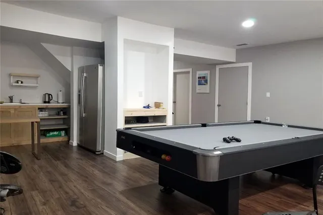 a view of a backyard with sitting area