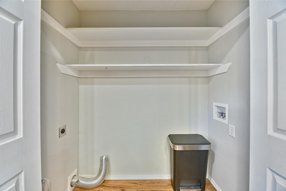 450 Midway Road, Unit 39 Medford, OR 97501 - Photo 7 of 21 a bathroom with a toilet and a chair