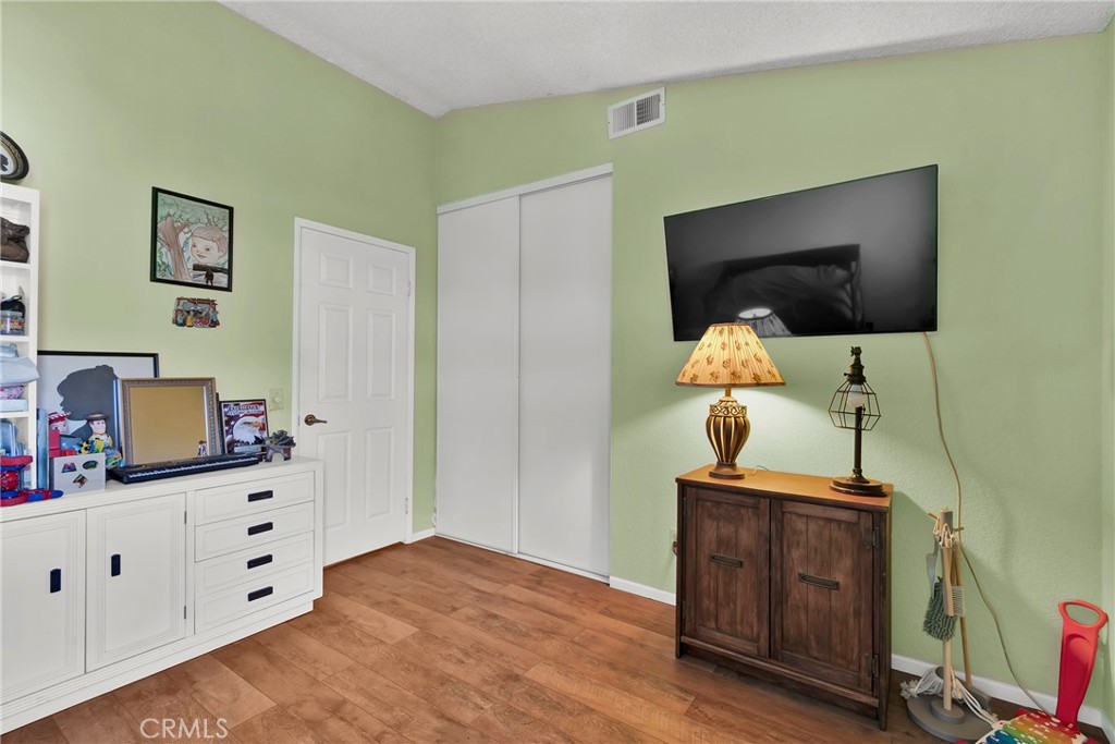 3350 May Court Riverside, CA 92503 - Photo 18 of 55 a living room with furniture and a flat screen tv