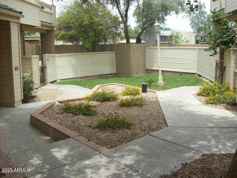 2035 South Elm Street, Unit 208 Tempe, AZ 85282 - Photo 7 of 8 a view of a backyard