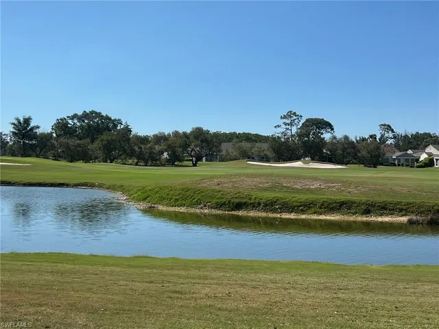 a view of a lake with a big yard