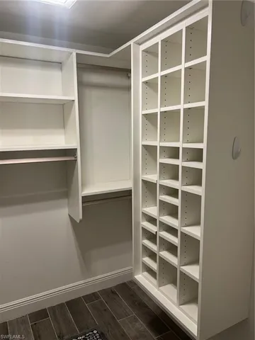 a view of an empty room with empty racks