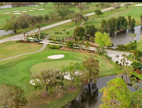 a view of yard with seating area and trees