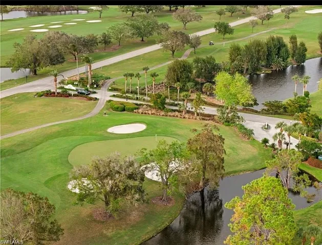 a view of yard with seating area and trees