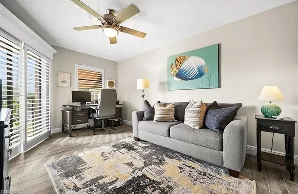 a living room with furniture or couch and a window