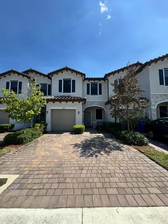 a house view with a backyard space
