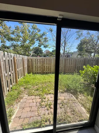 a view of backyard from a window