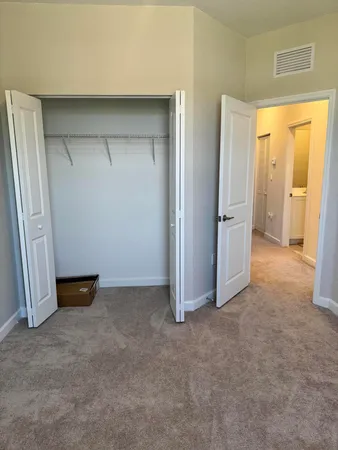 an empty room with closet