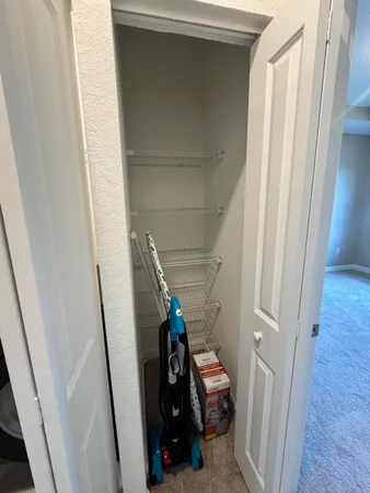 a view of storage and utility room