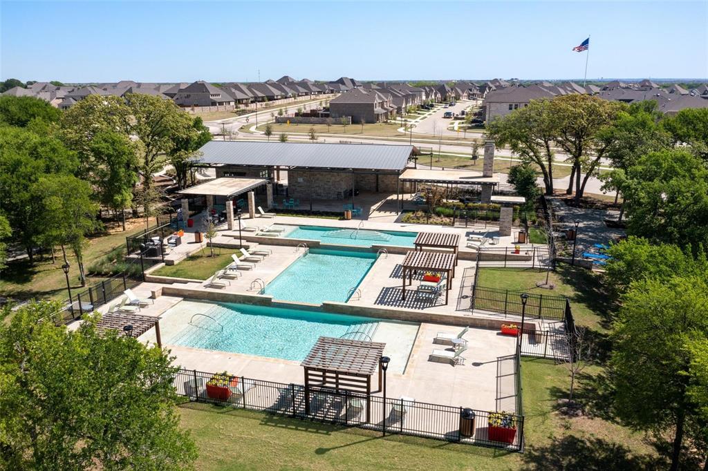 9600 Acorn Lane Little Elm, TX 75068 - Photo 29 of 34 an aerial view of a house with a yard swimming pool and outdoor seating