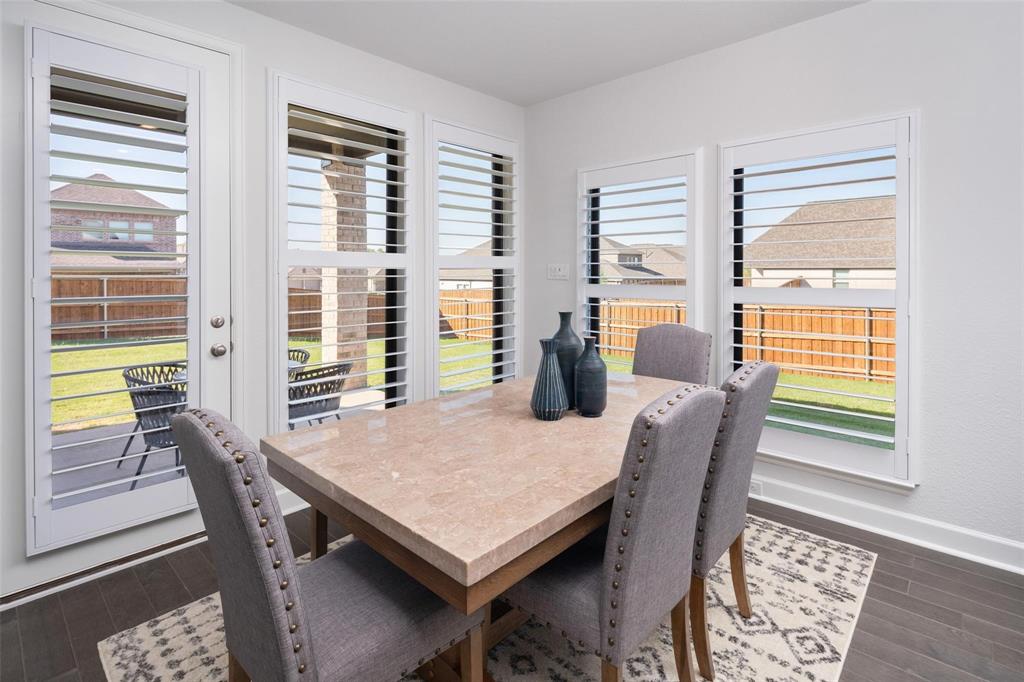 9600 Acorn Lane Little Elm, TX 75068 - Photo 10 of 34 a view of a dining room with furniture