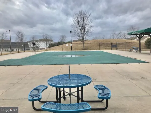 a view of a terrace with an umbrella