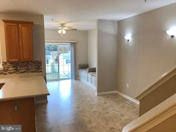 a view of a kitchen cabinets and a counter place