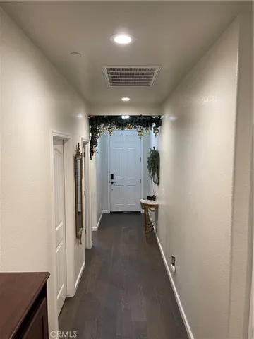 a kitchen with stainless steel appliances granite countertop a sink dishwasher and cabinets