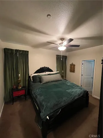 a spacious bathroom with a double vanity sink and mirror