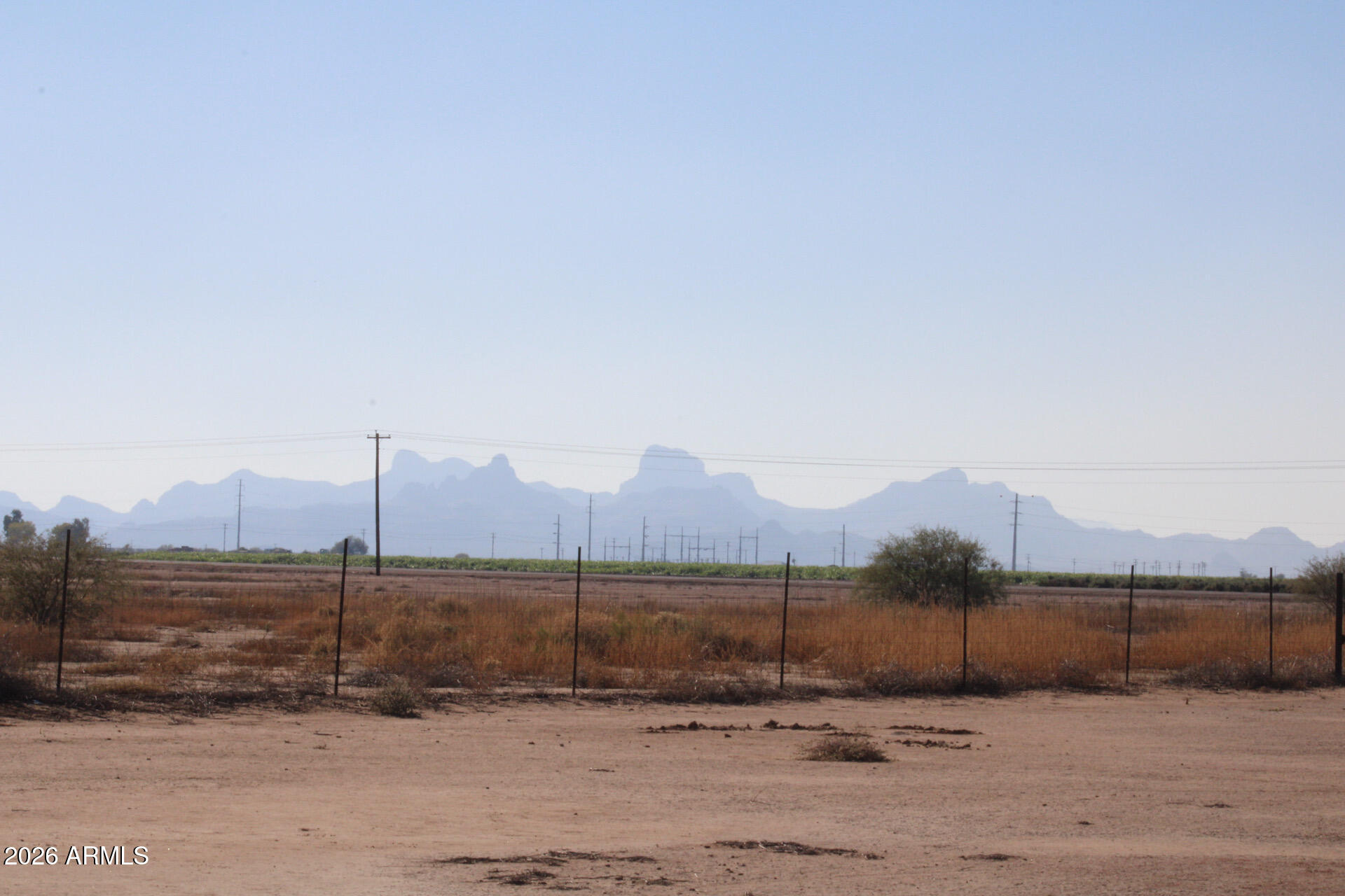21503 South Toltec Road, Unit 9 Eloy, AZ 85131 - Photo 7 of 8 a view of a dry yard