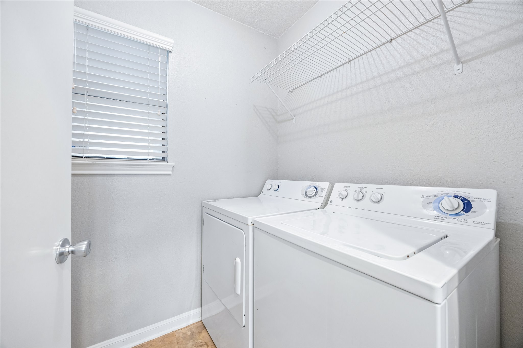 3845 Ranch Road 2222, Unit 33 Austin, TX 78731 - Photo 13 of 21 a utility room with dryer and washer