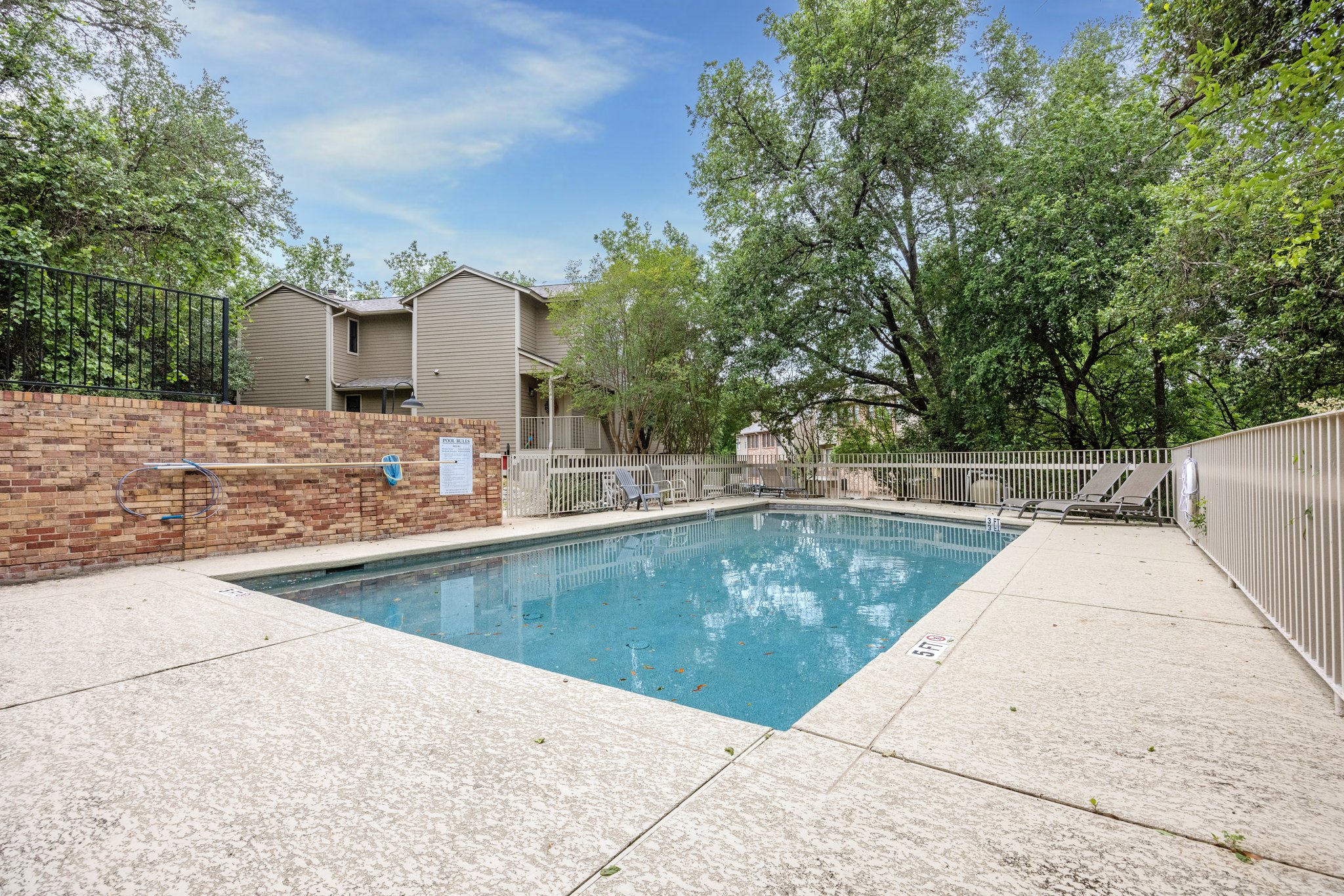 3845 Ranch Road 2222, Unit 33 Austin, TX 78731 - Photo 15 of 21 a view of a swimming pool with a patio