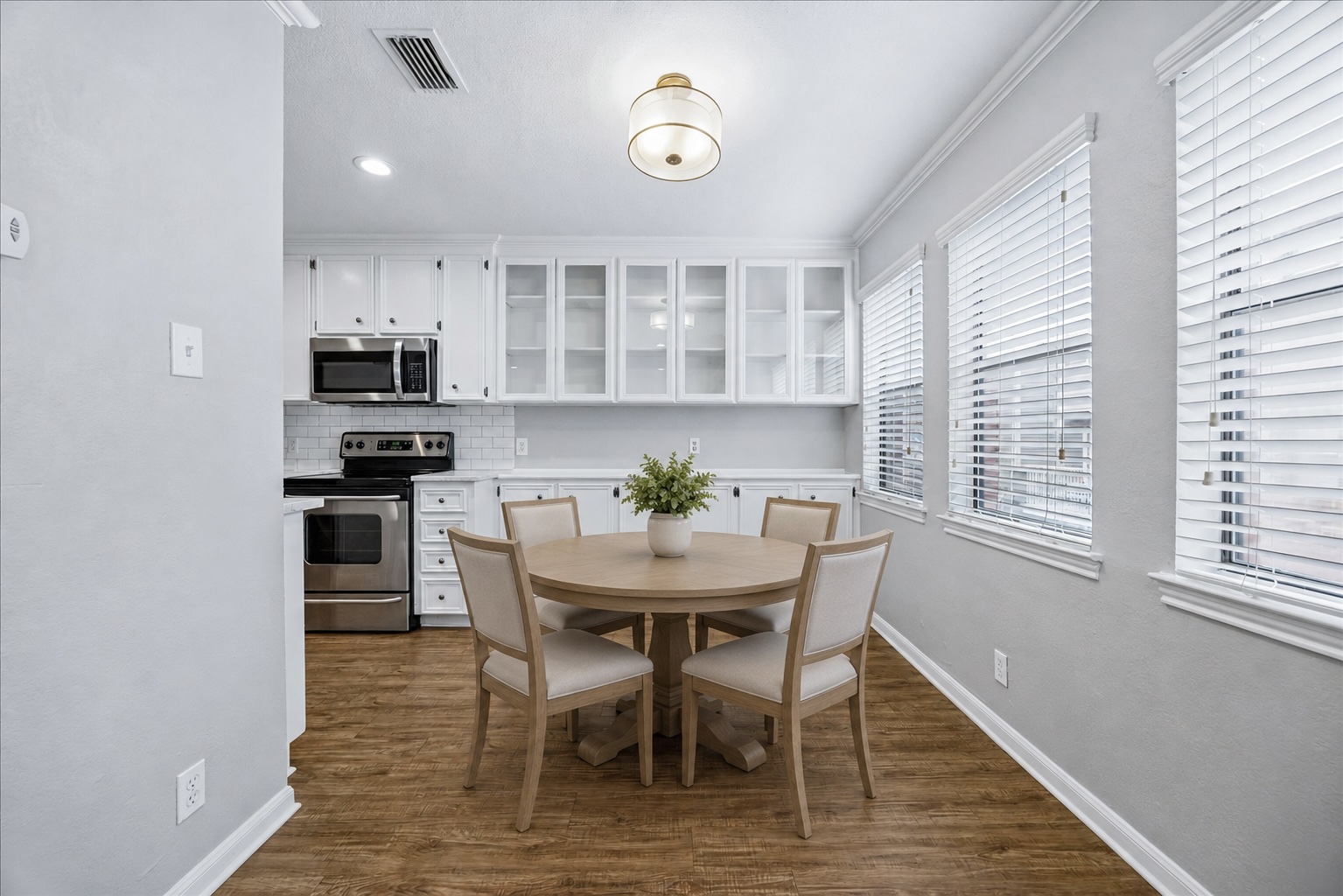 3845 Ranch Road 2222, Unit 33 Austin, TX 78731 - Photo 4 of 21 a view of a dining room with furniture and a window