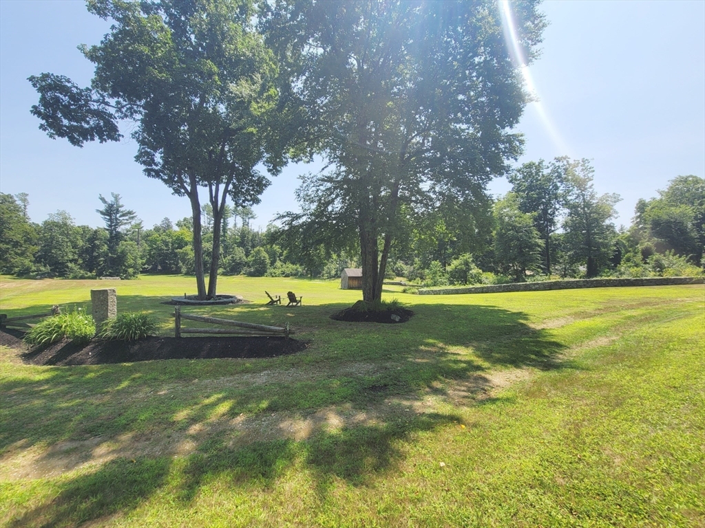 0 Old Dunstable Road Groton, MA 01450 - Photo 11 of 32 a view of yard with swimming pool and green space