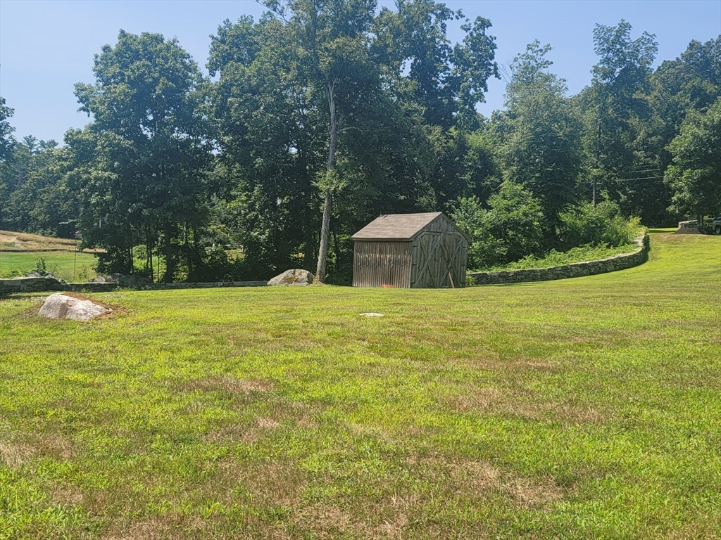 0 Old Dunstable Road Groton, MA 01450 - Photo 21 of 32 a view of a house with a yard