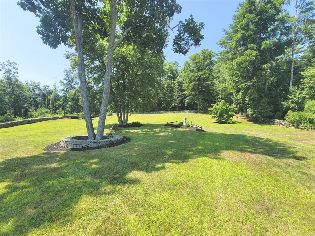 0 Old Dunstable Road Groton, MA 01450 - Photo 25 of 32 a view of a swimming pool with a yard
