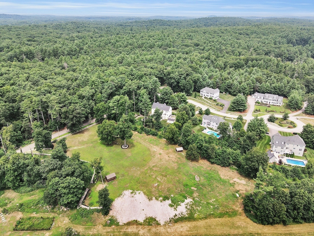 0 Old Dunstable Road Groton, MA 01450 - Photo 26 of 32 a view of a lake with a city