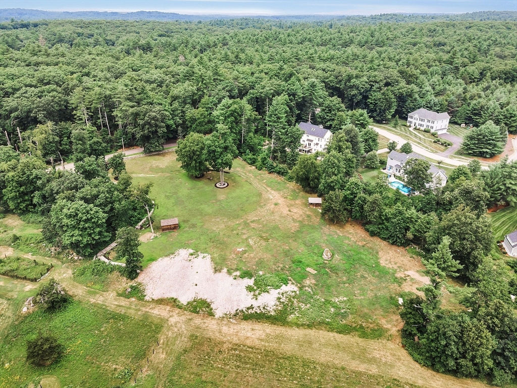 0 Old Dunstable Road Groton, MA 01450 - Photo 27 of 32 a view of a lake with a yard