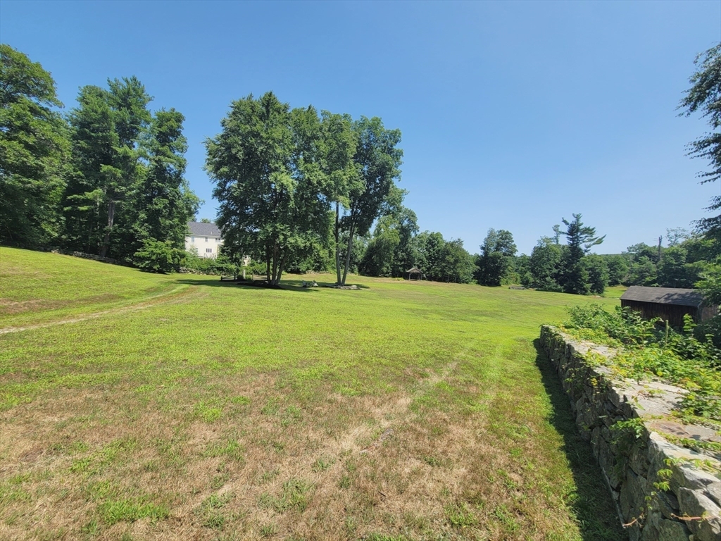 0 Old Dunstable Road Groton, MA 01450 - Photo 10 of 32 a view of a green field with clear sky