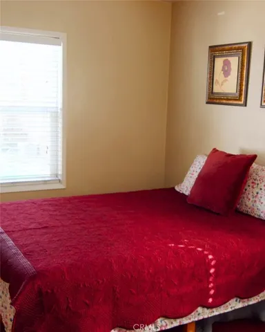 a table with chair and a window