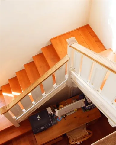 a bedroom with a bed and cabinets
