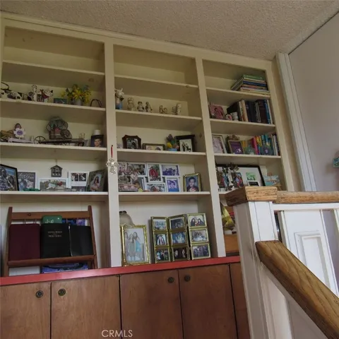 a room with multiple racks and has more things on it