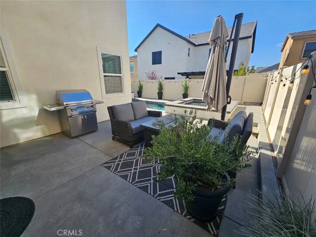 a shelf with books and knick knacks on it