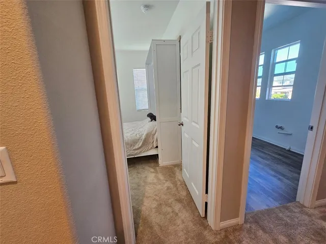 a view of a bathroom with wooden floor