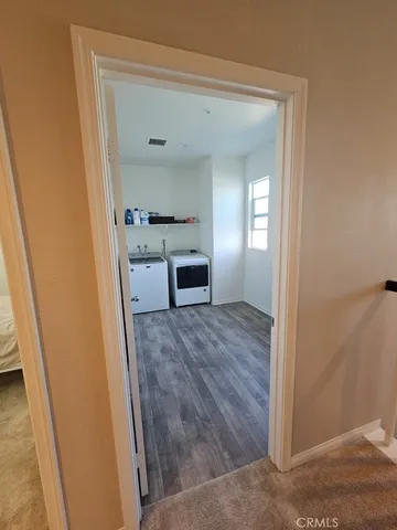 a bedroom with a bed and furniture