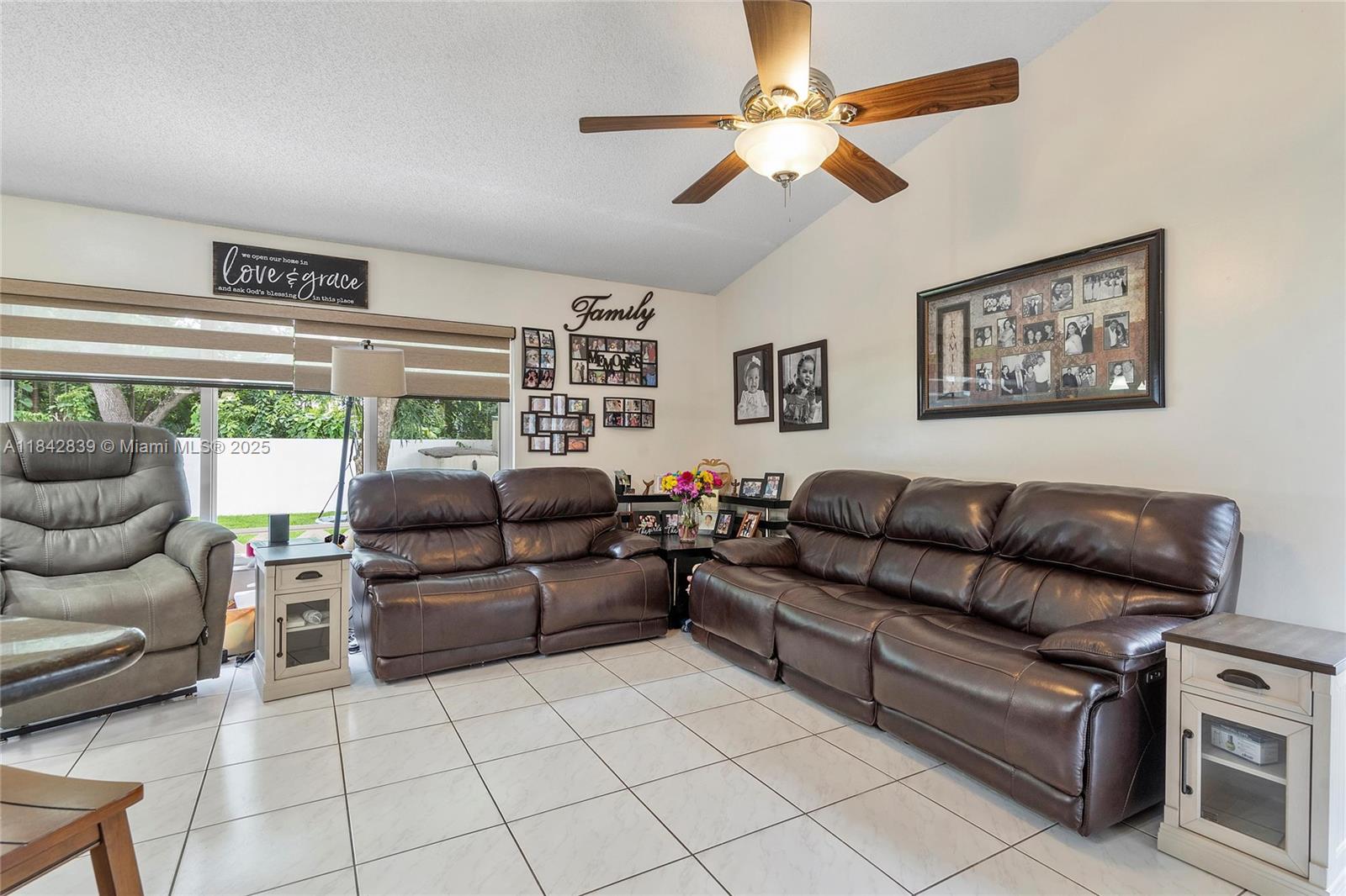 1841 Southwest 124th Way Miramar, FL 33027 - Photo 13 of 34 a living room with furniture and a window
