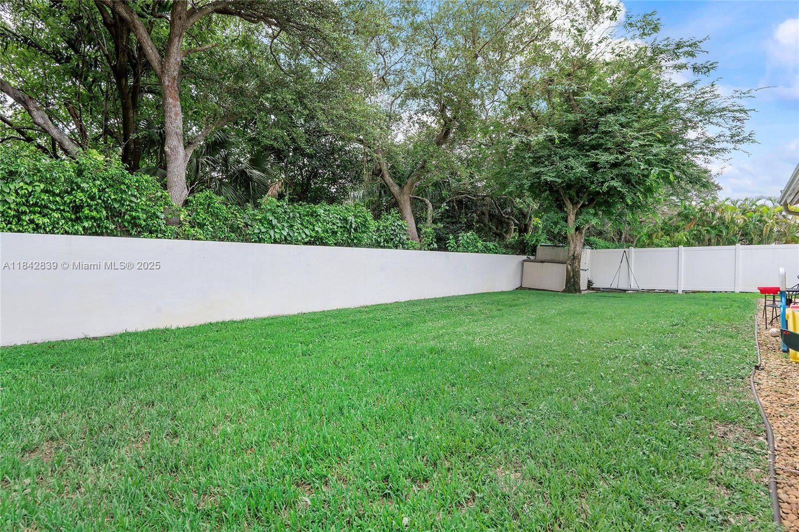 1841 Southwest 124th Way Miramar, FL 33027 - Photo 32 of 34 a view of yard with green space