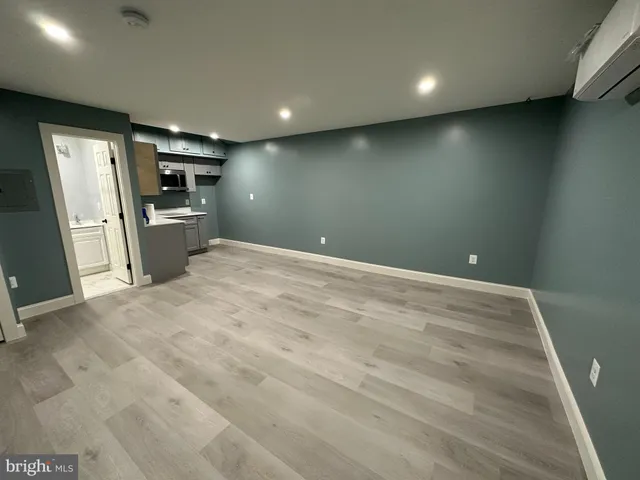 a view of a kitchen with a sink