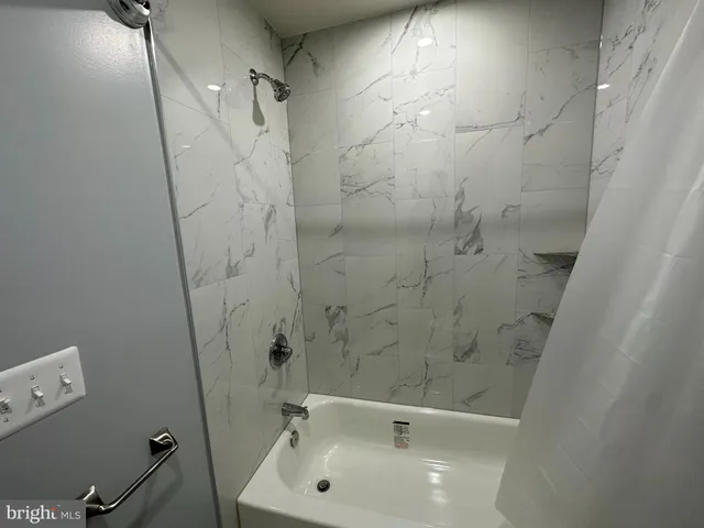 a car parked in front of a house