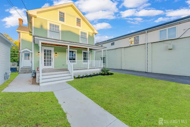 a view of a back yard of the house