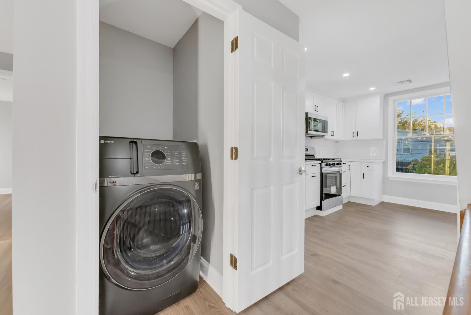 15 North Main Street, Unit B Pennington, NJ 08534 - Photo 6 of 16 a view of a kitchen with washer and dryer