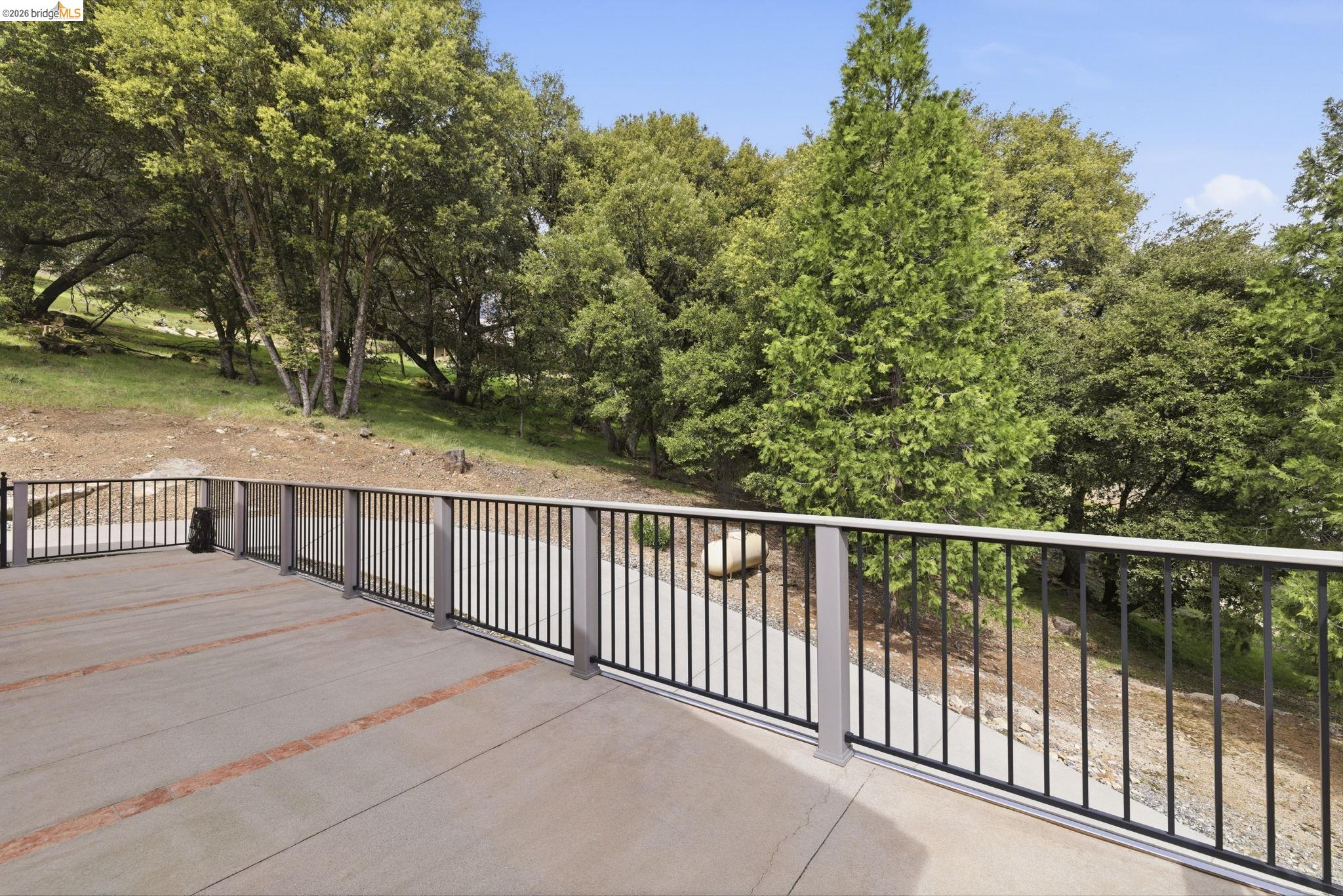 21955 Fallview Drive Sonora, CA 95370 - Photo 20 of 32 a balcony with trees in front of it